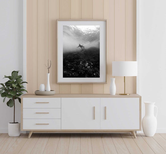 Framed Artwork with a natural frame in a living room