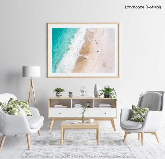 Aerial blue water and people walking on Camps Bay beach Cape Town in a natural fine art frame