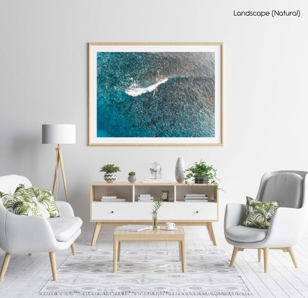 Aerial of kayak surfing on a shallow wave at Bower in Manly Sydney in a natural fine art frame