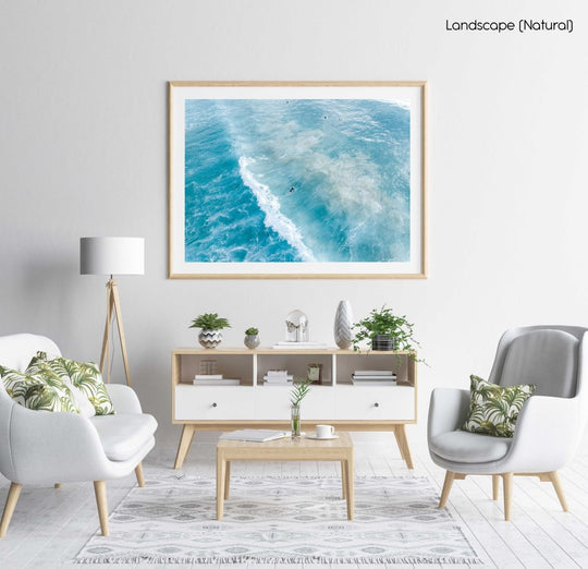 Surfers on whitewash from above in Sydney Australia in a natural fine art frame