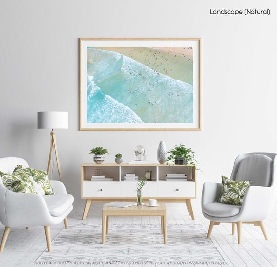 Lots of swimmers in the waves at Manly Beach in Sydney in a natural fine art frame