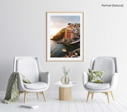 Docked boats and colorful buildings at sunset in Riomaggiore Cinque Terre in a natural fine art frame