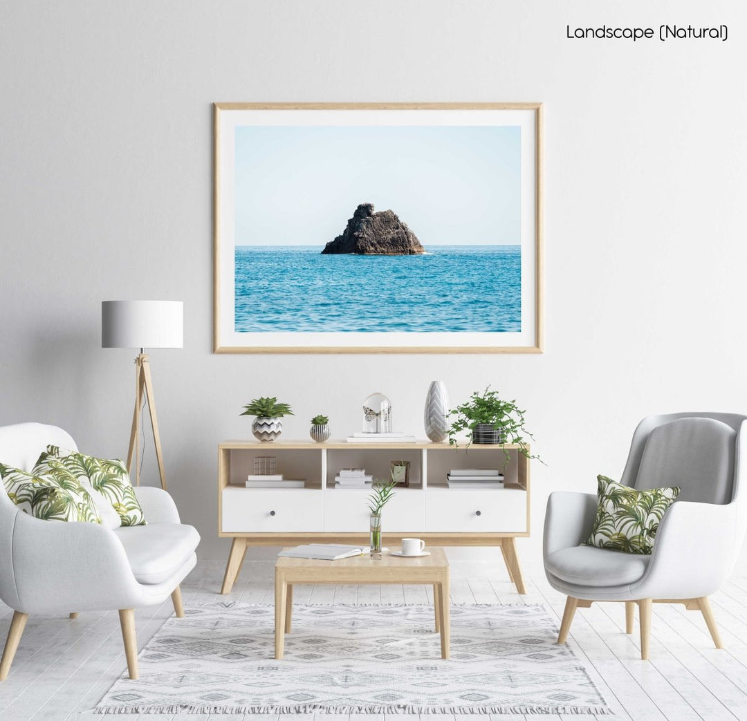 Big rock in middle of blue ocean Cinque Terre in a natural fine art frame