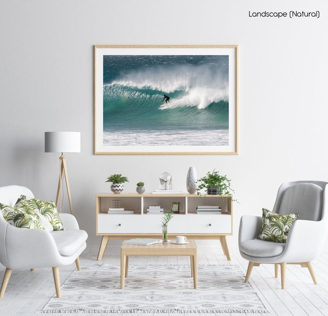 Surfer on blue wave at Jeffrey's Bay
