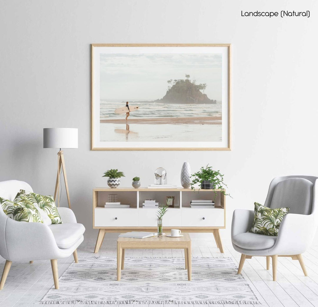 Girl walking with longboard in byron bay