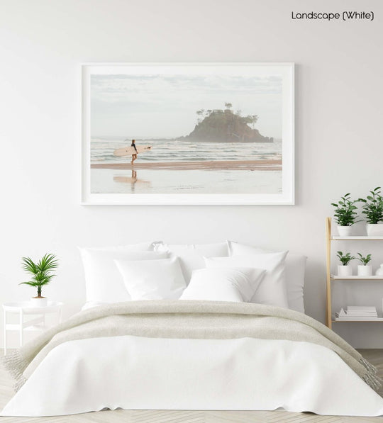 Girl walking with longboard in byron bay