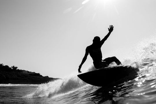 Local surfer on wave in Tofo, Mozambique, captured with Seafrogs camera housing