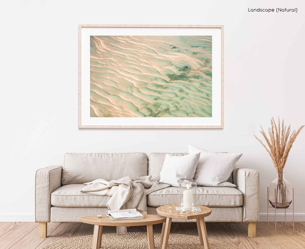 Framed Artwork with a natural frame in a living room