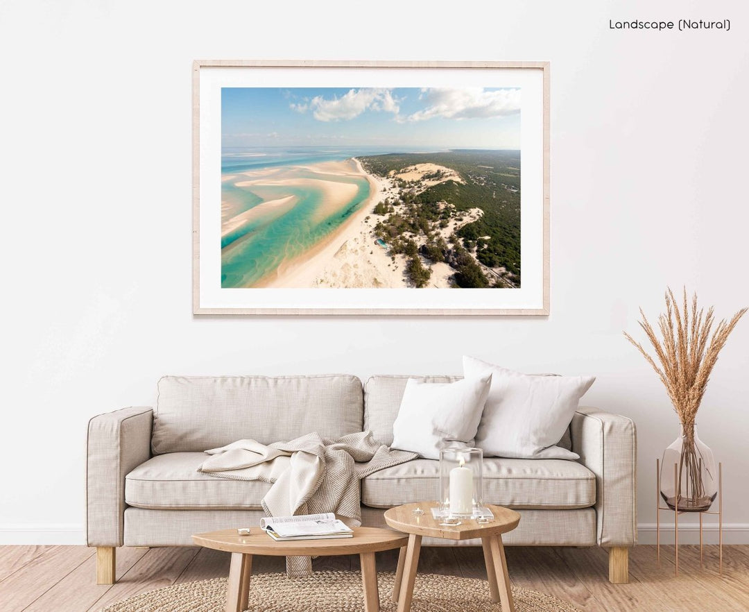 Framed Artwork with a natural frame in a living room