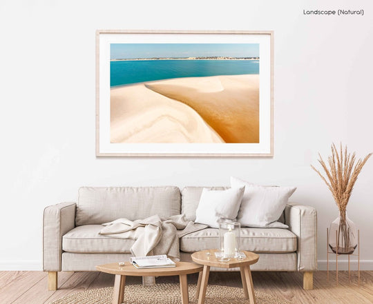 Framed Artwork with a natural frame in a living room