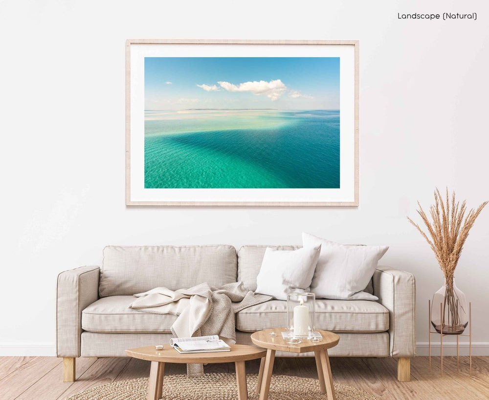 Framed Artwork with a natural frame in a living room