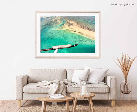 Framed Artwork with a natural frame in a living room