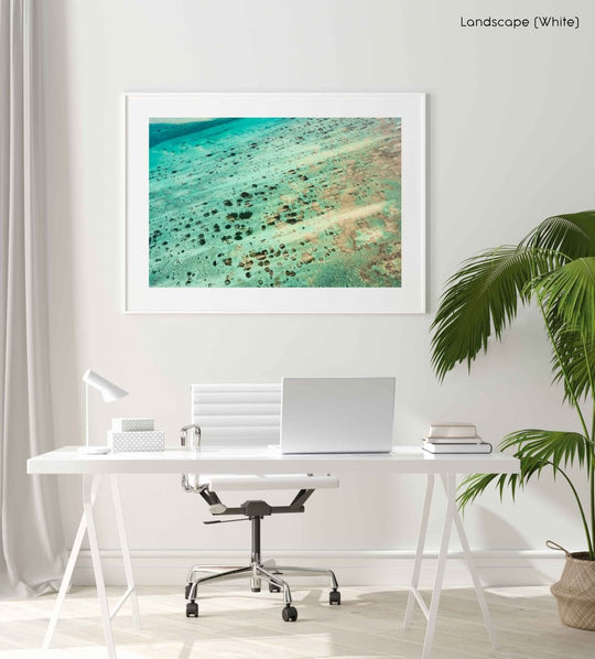 Framed Artwork with a white frame  in an office space