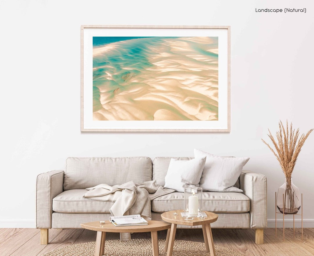 Framed Artwork with a natural frame in a living room