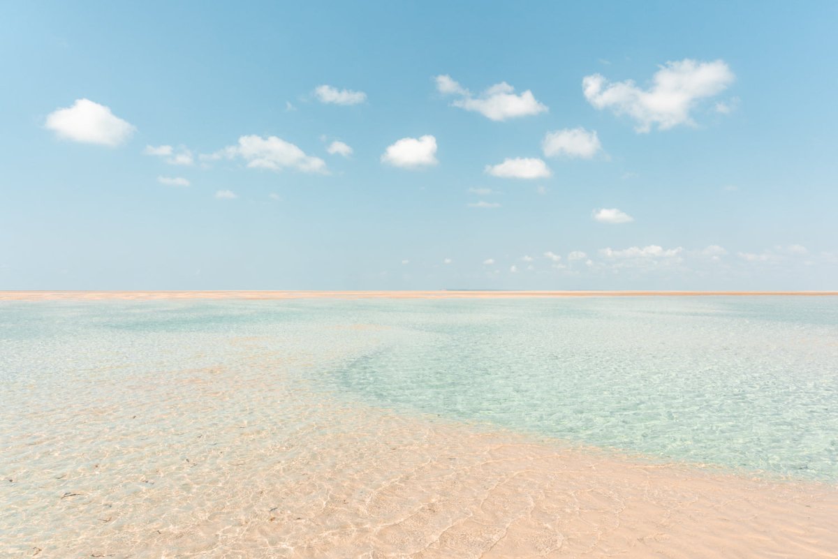 Crystal clear blue water and sand banks along the coast in Bazaruto Archipelago, Mozambique