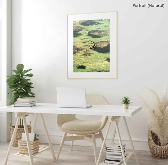 Framed Artwork with a natural frame in a living room