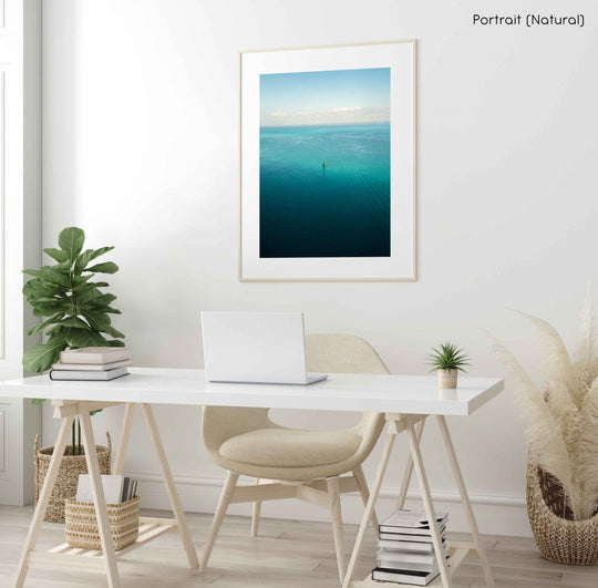 Framed Artwork with a natural frame in a living room