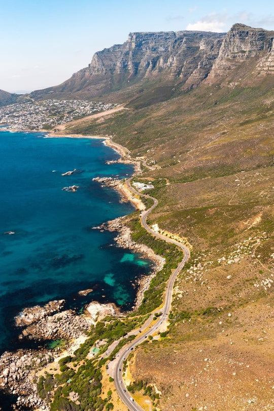 Aerial image taken of the twelve apostles and victoria road in Cape Town, South Africa.