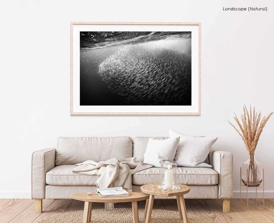 Framed Artwork with a natural frame in a living room