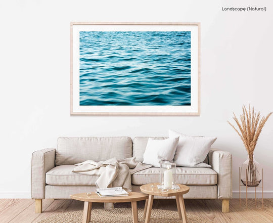 Framed Artwork with a natural frame in a living room