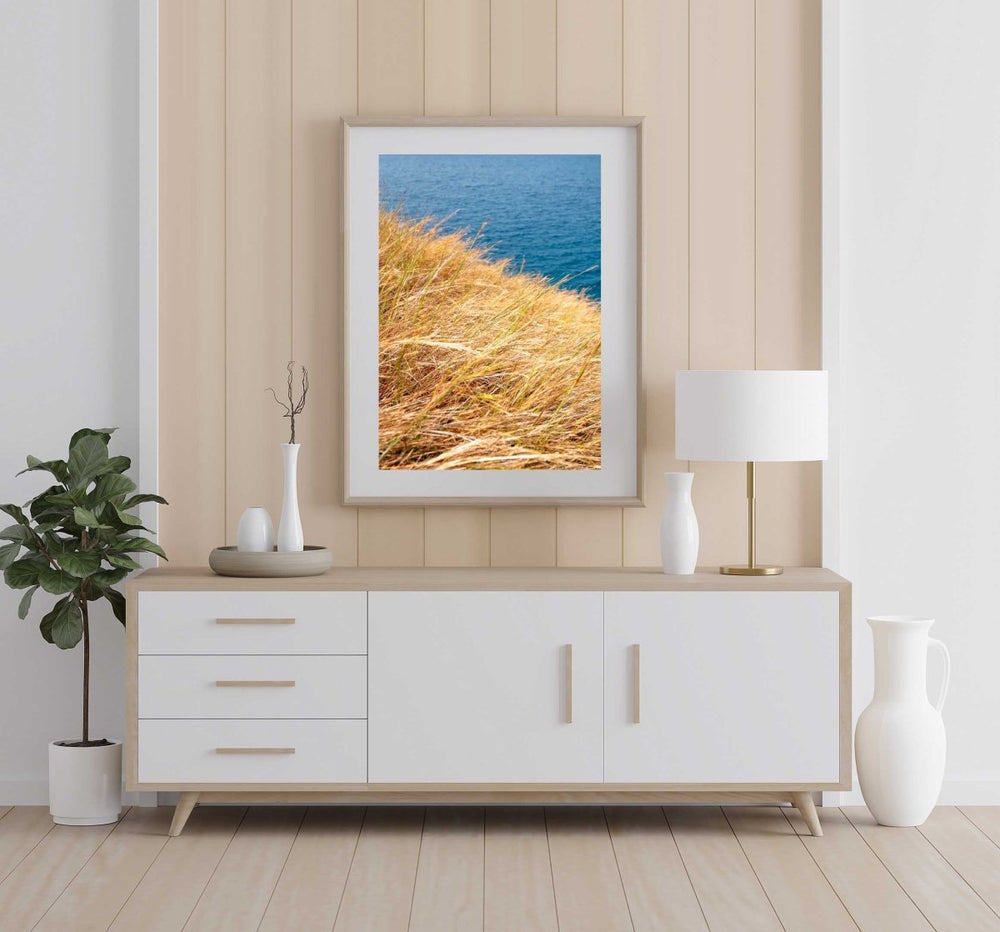 Framed Artwork with a natural frame in a living room