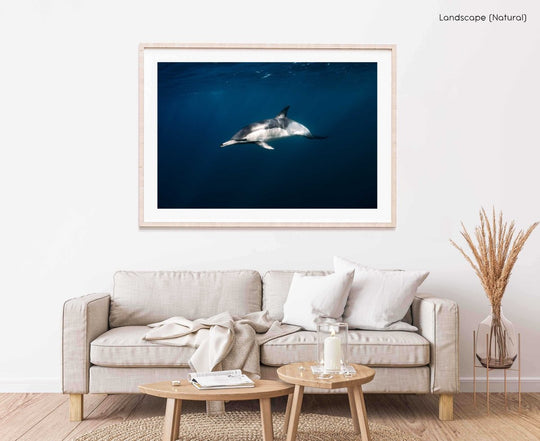 Framed Artwork with a natural frame in a living room