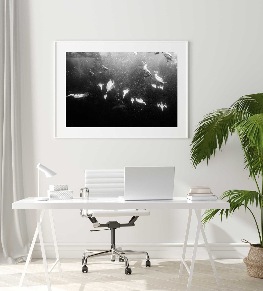 Framed Artwork with a white frame in an office space