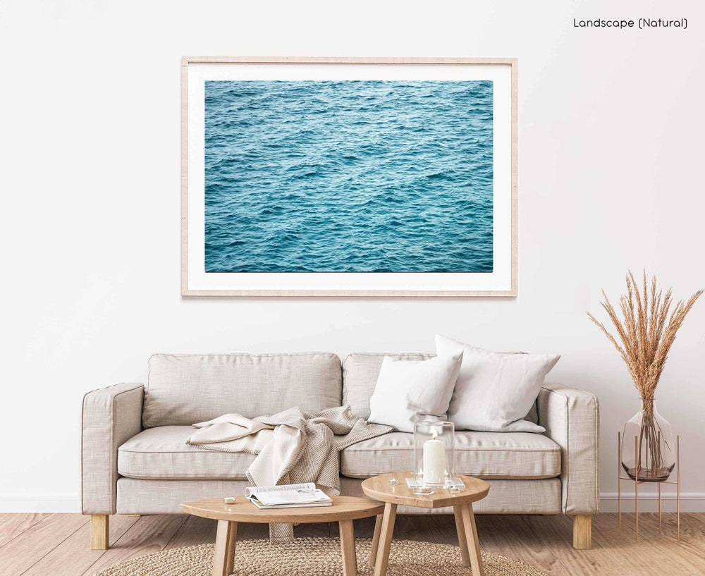 Framed Artwork with a natural frame in a living room