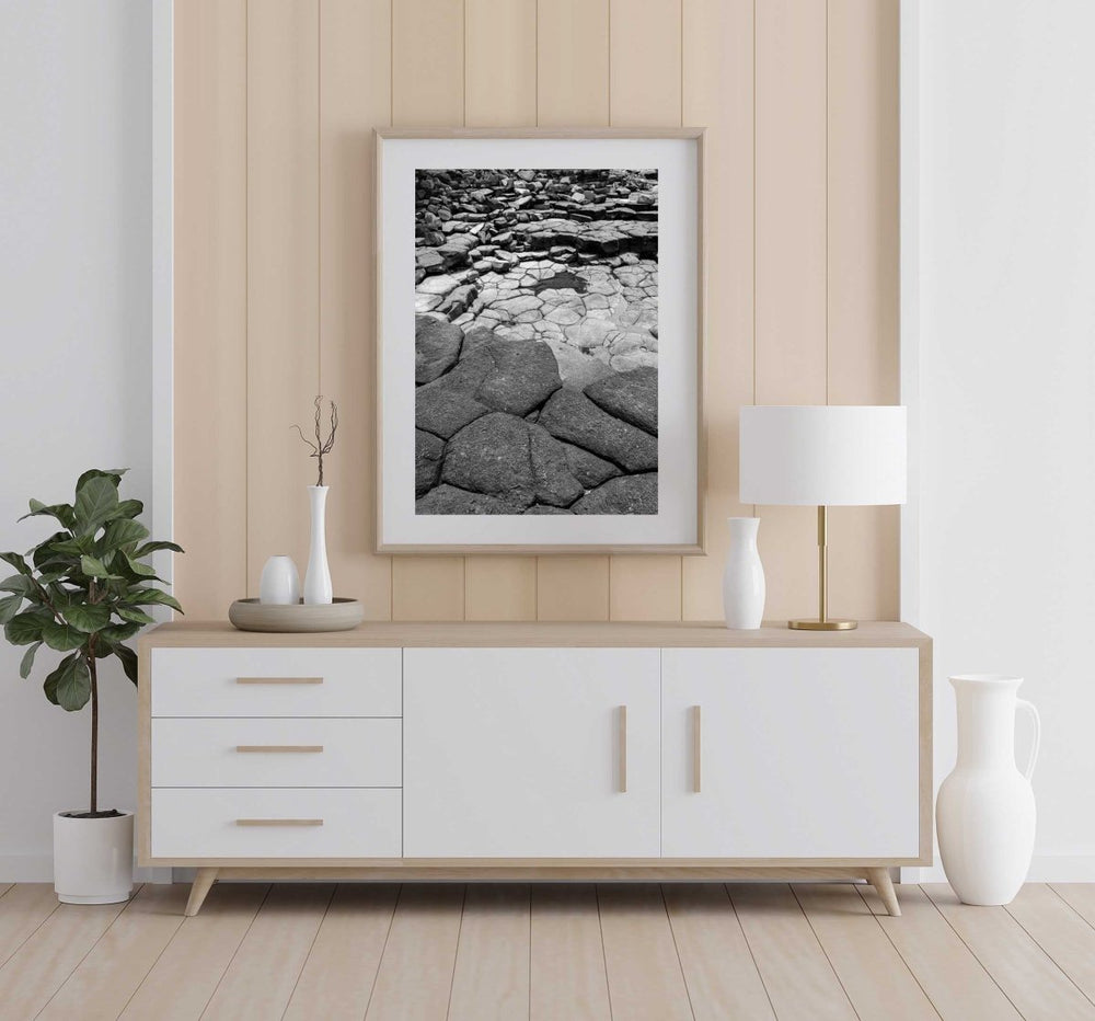 Framed Artwork with a natural frame in a living room