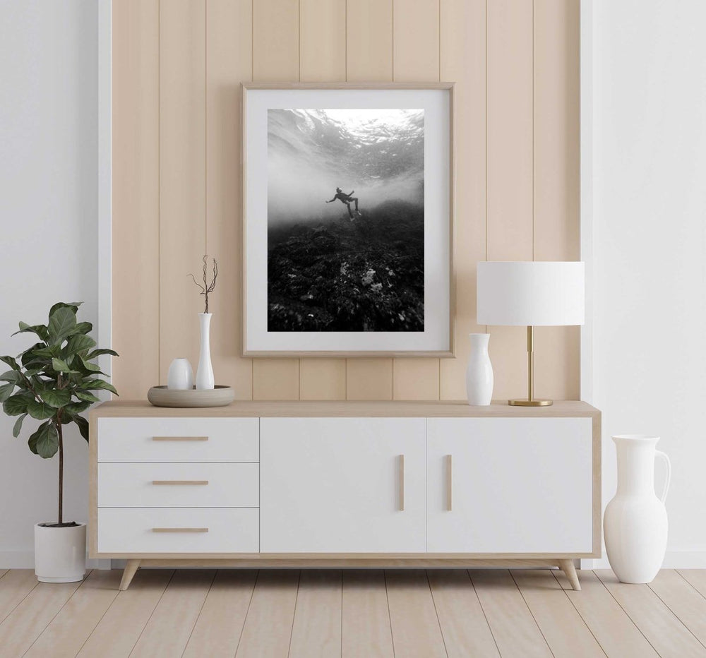 Framed Artwork with a natural frame in a living room