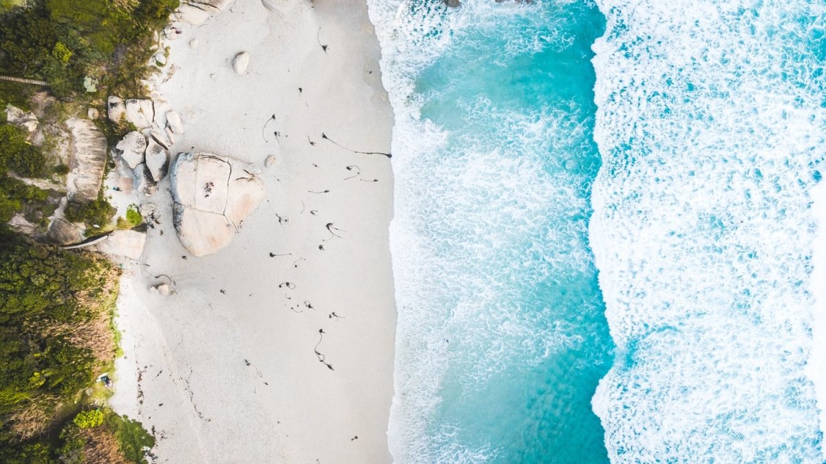 Aerial of waves and rocks on Llandudno beach Cape Town