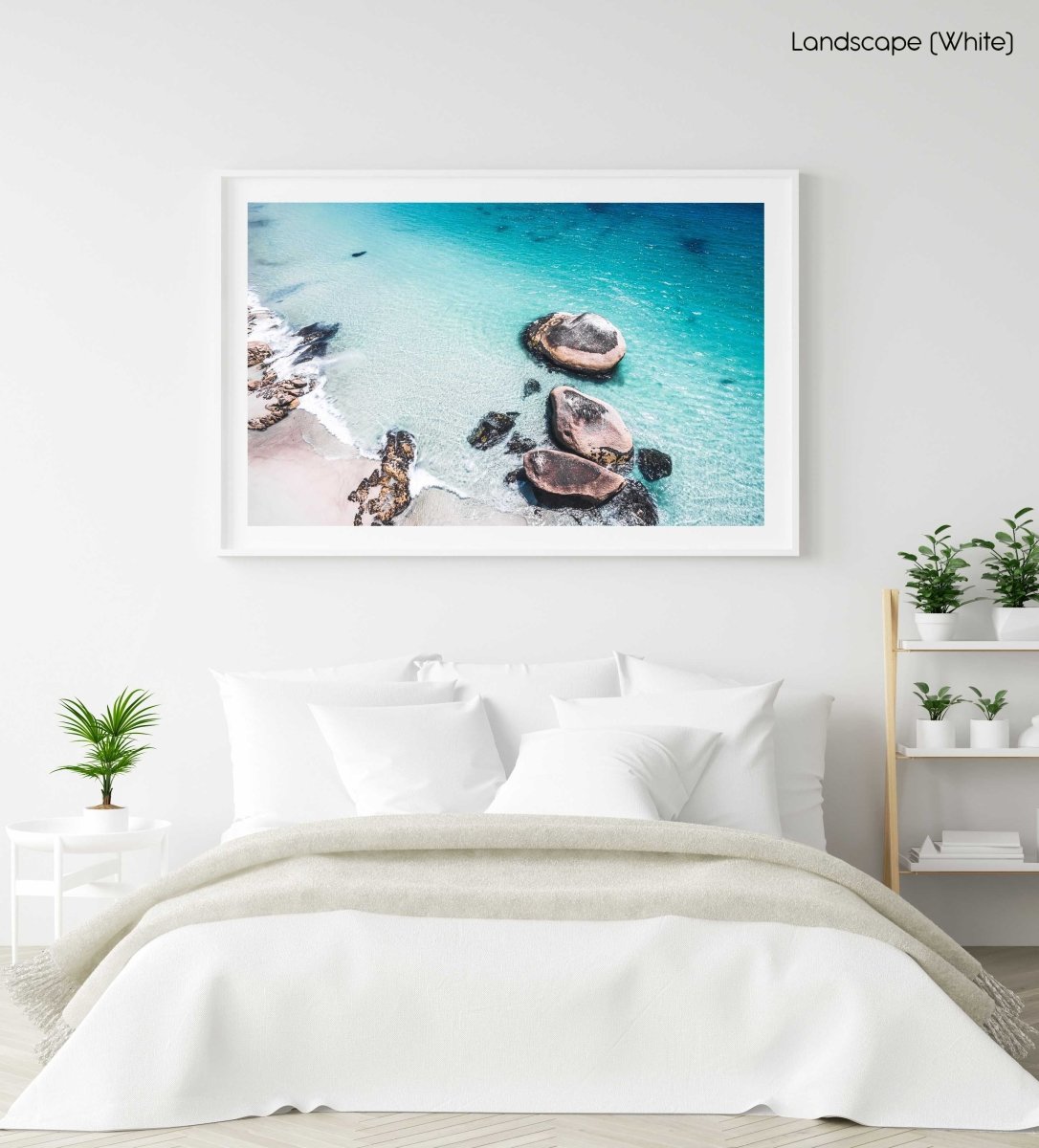 Aerial rocks on clifton beach in clear blue water in a white fine art frame