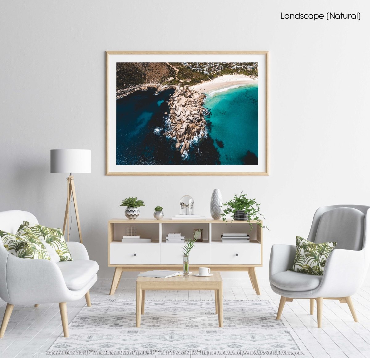 Aerial rocky point with surfers at Llandudno Beach in Cape Town in a natural fine art frame