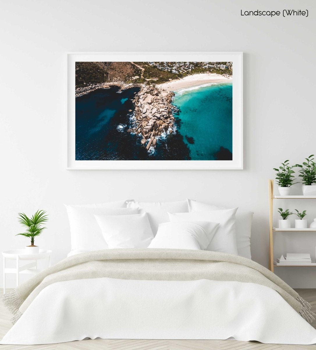 Aerial rocky point with surfers at Llandudno Beach in Cape Town in a white fine art frame