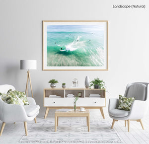 Aerial of surfer carving on a green wave taken at Llandudno Beach in Cape Town in a natural fine art frame