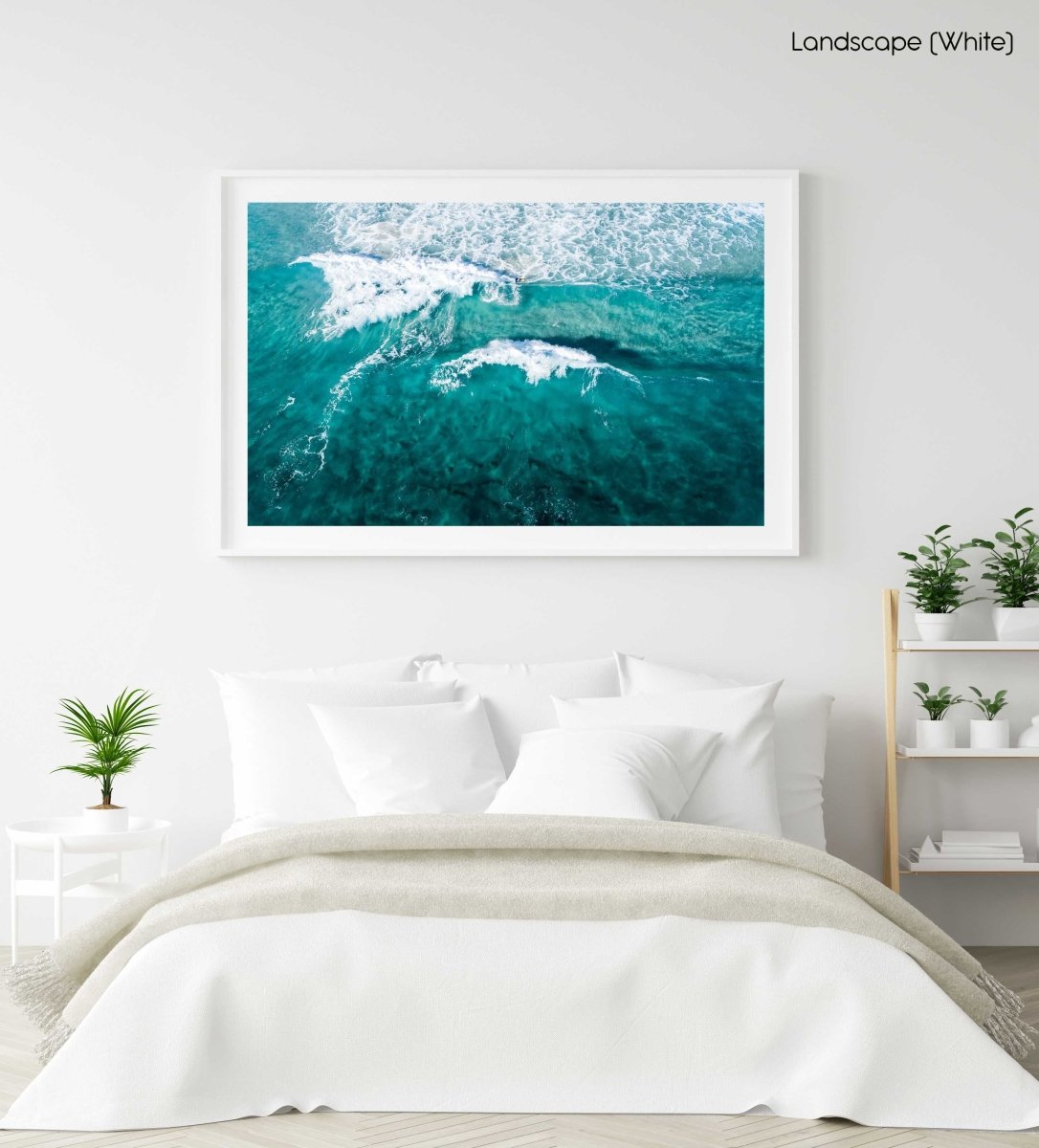 Aerial of two waves breaking in blue ocean in Cape Town in a white fine art frame