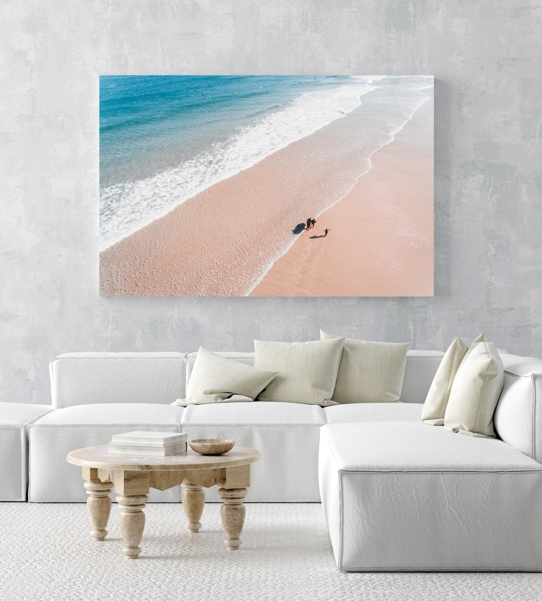 Aerial of father and daughter playing on Cape Town beach in an acrylic/perspex frame