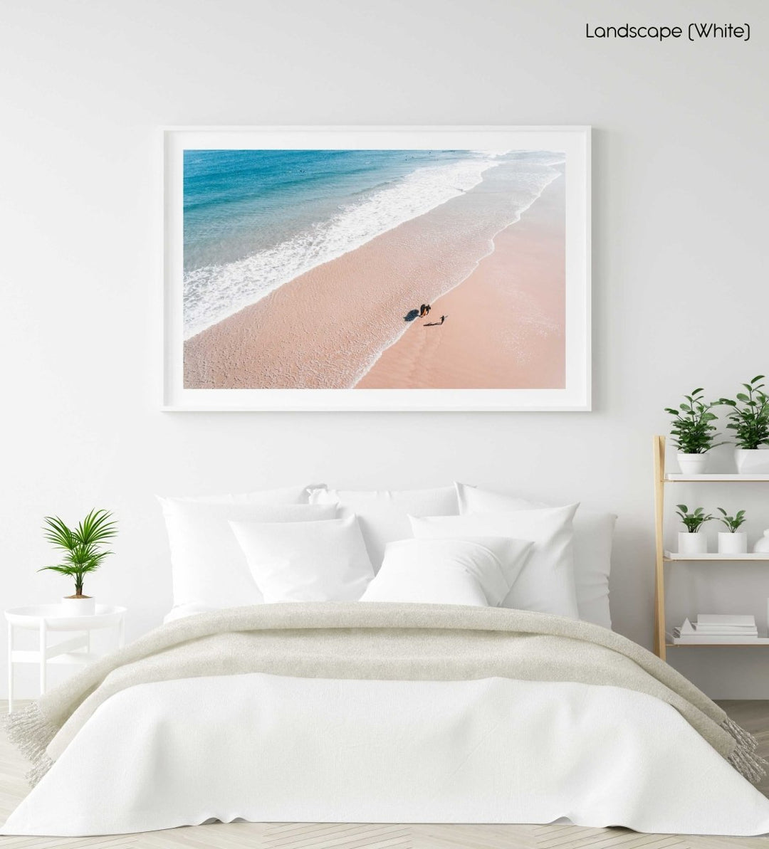 Aerial of father and daughter playing on Cape Town beach in a white fine art frame