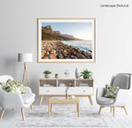 Pebbles and the sea at the twelve apostles mountains in Cape Town in a natural fine art frame