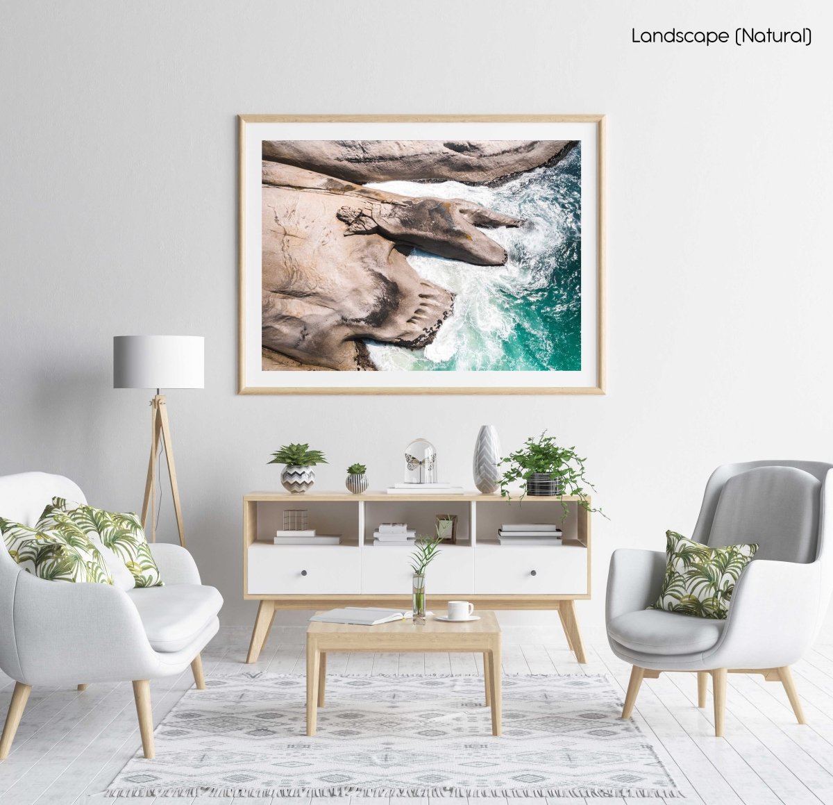 Modern shaped boulders in the ocean in Cape Town aerial in a natural fine art frame
