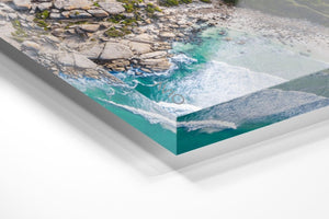 Aerial boulders in sea in Llandudno Beach Cape Town in an acrylic/perspex frame