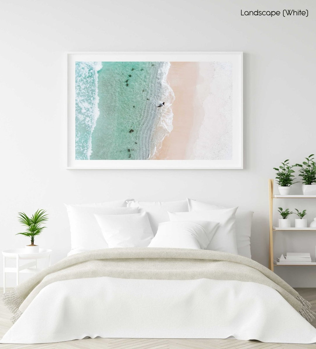 Aerial topdown of surfer walking out of water in Cape Town in a white fine art frame