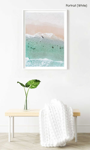 Aerial topdown of surfer walking out of water in Cape Town in a white fine art frame