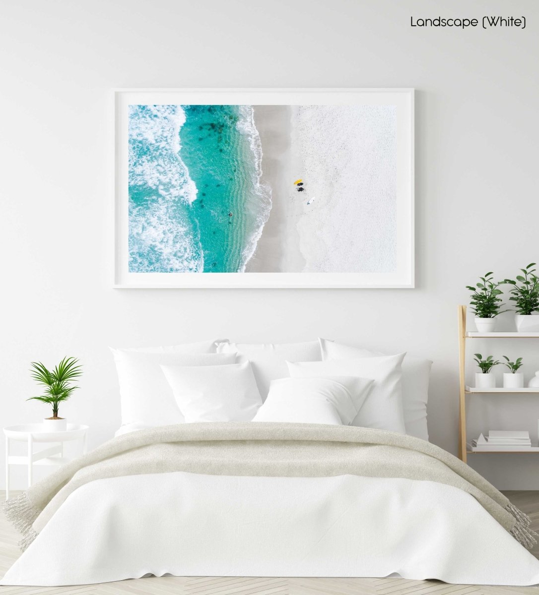 Aerial of two surfers sitting on Glen Beach in Cape Town in a white fine art frame