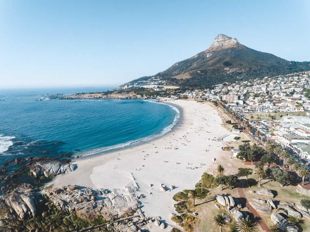 Aerial of camps bay beach and lions head in cape town