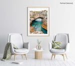 Turquoise water flowing through rock arch in arniston south africa in a natural fine art frame