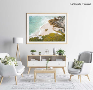 Rock in middle of a sandy beach in arniston south africa in a natural fine art frame
