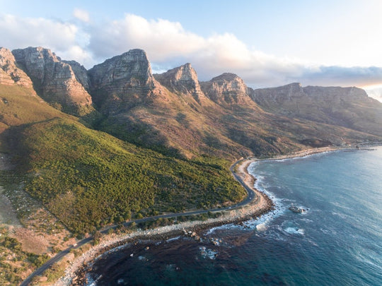 Scenic road along the twelve apostles mountains in cape town during sunset