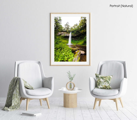 Big waterfall and green vegetation in Mount Kenya in a natural fine art frame