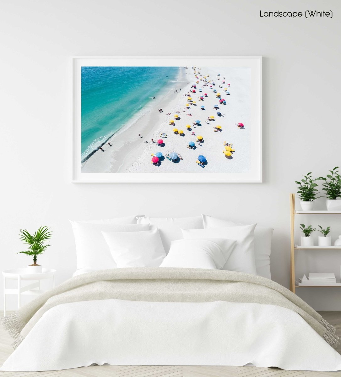 Aerial colorful umbrellas and people in sun on Camps Bay beach Cape Town in a white fine art frame